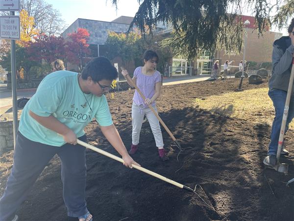 Permaculture students prepare the grounds with nutrients 4